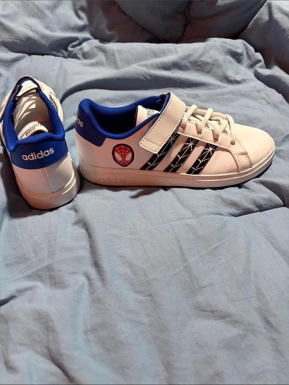 adidas Kids White and Blue Sneakers with Black Three-Stripes and Spider Emblem